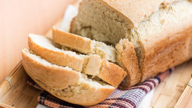 Freshly baked white bread on a wooden board, 7up bread