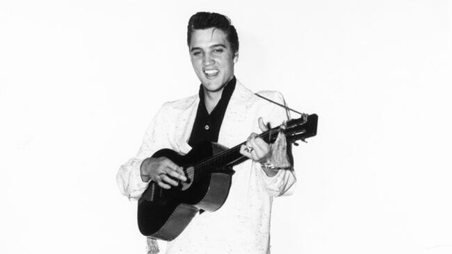 Elvis in 1956, at age 21, the year he starred on The Ed Sullivan Show and zoomed to national fame