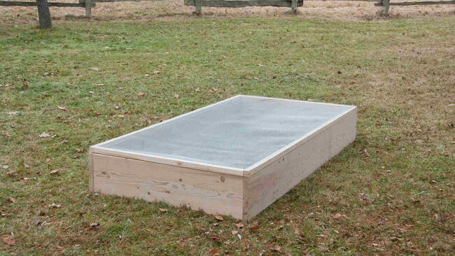 DIY Raised Garden Bed on grassy lawn
