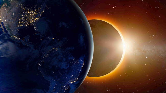Illustration of Earth, the Moon, and the Sun aligned during a solar eclipse.