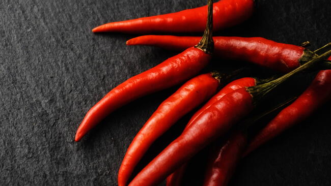 red Chili Peppers on a black backgroun