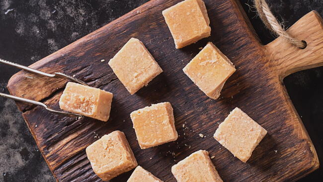 Sour Cream Fudge on a Wooden Cutting Board