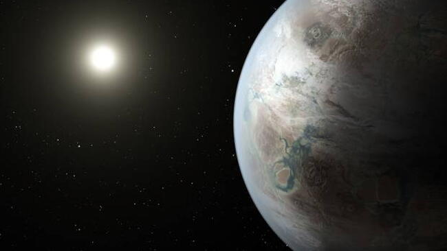 an earth-like planet shown with the sun in the background