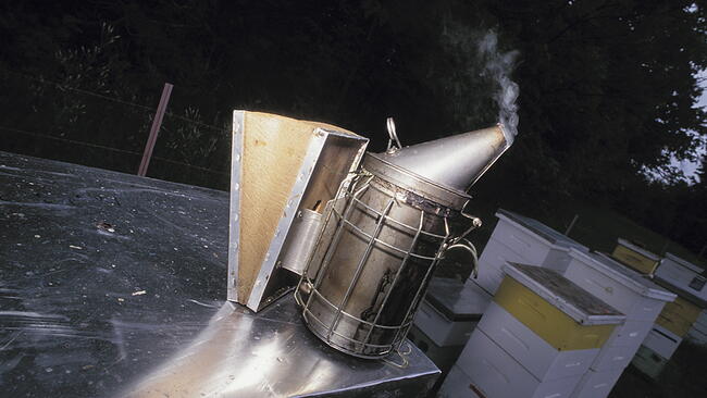 a smoker made of silver metal