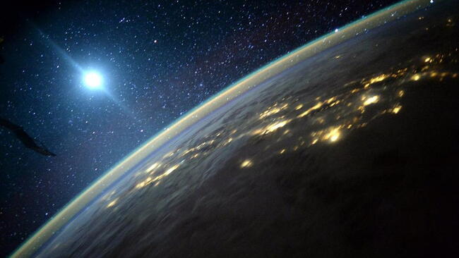 a view of the earth and the moon from the sun