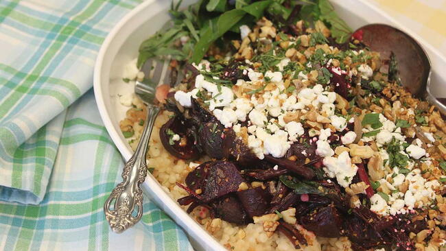Raspberry Roasted Beets and Chèvre Over Shallot, Walnut, and Beet Greens Couscous