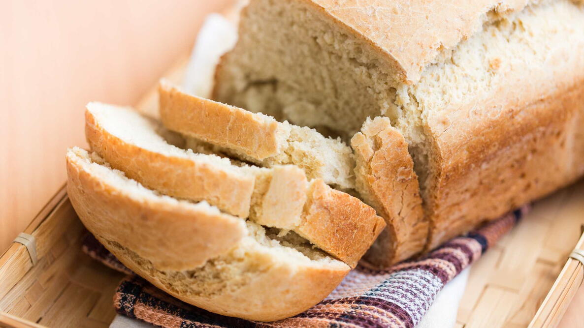 Freshly baked white bread on a wooden board, 7up bread
