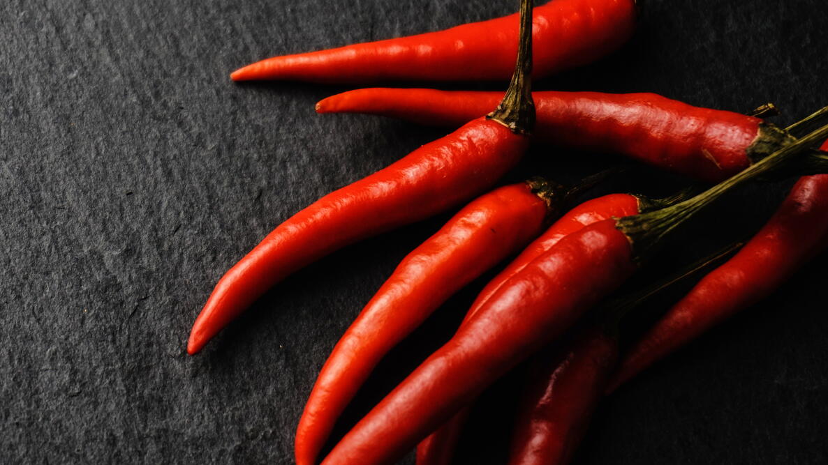 red Chili Peppers on a black backgroun