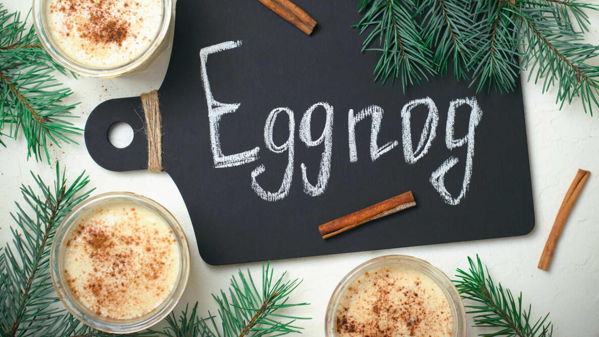 Eggnog, Traditional Christmas Drink, Homemade Cocktail with Cinnamon and Nutmeg for Winter Holidays, Top View eggnog mocktail non-alcoholic