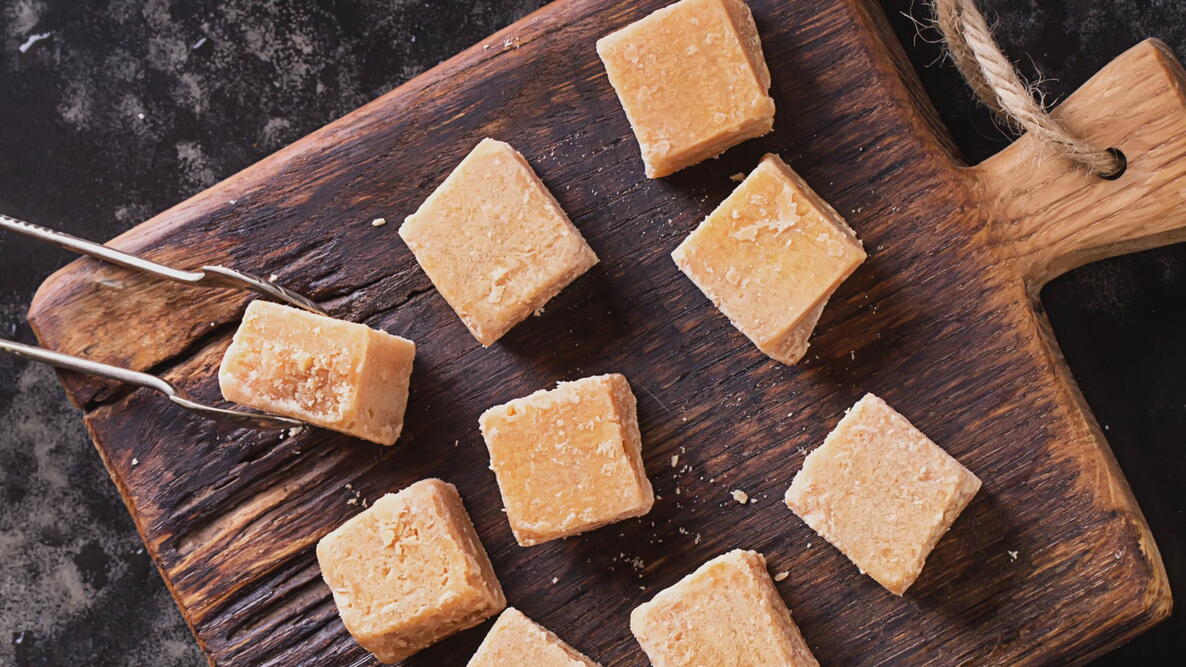 Sour Cream Fudge on a Wooden Cutting Board