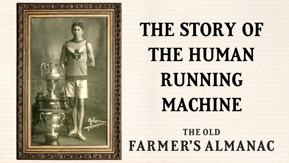 tom longboat, the human running machine. photo of runner next to a large trophy