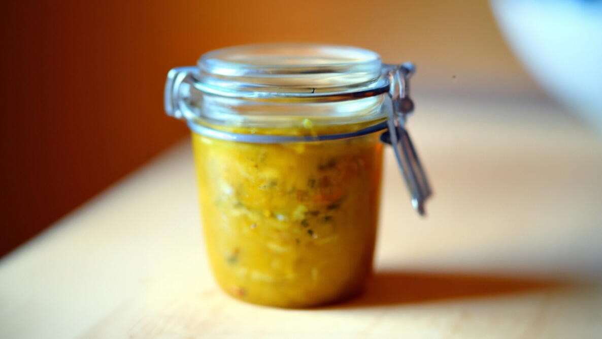 zucchini relish in a jar on a table