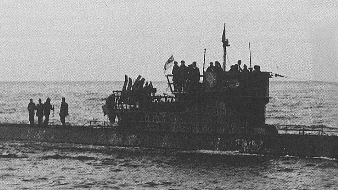black and white image of WWII U-boat with men on deck