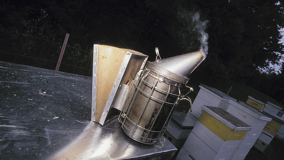a smoker made of silver metal