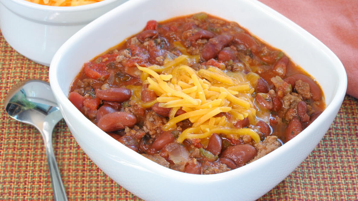 chili in a bowl with cheese