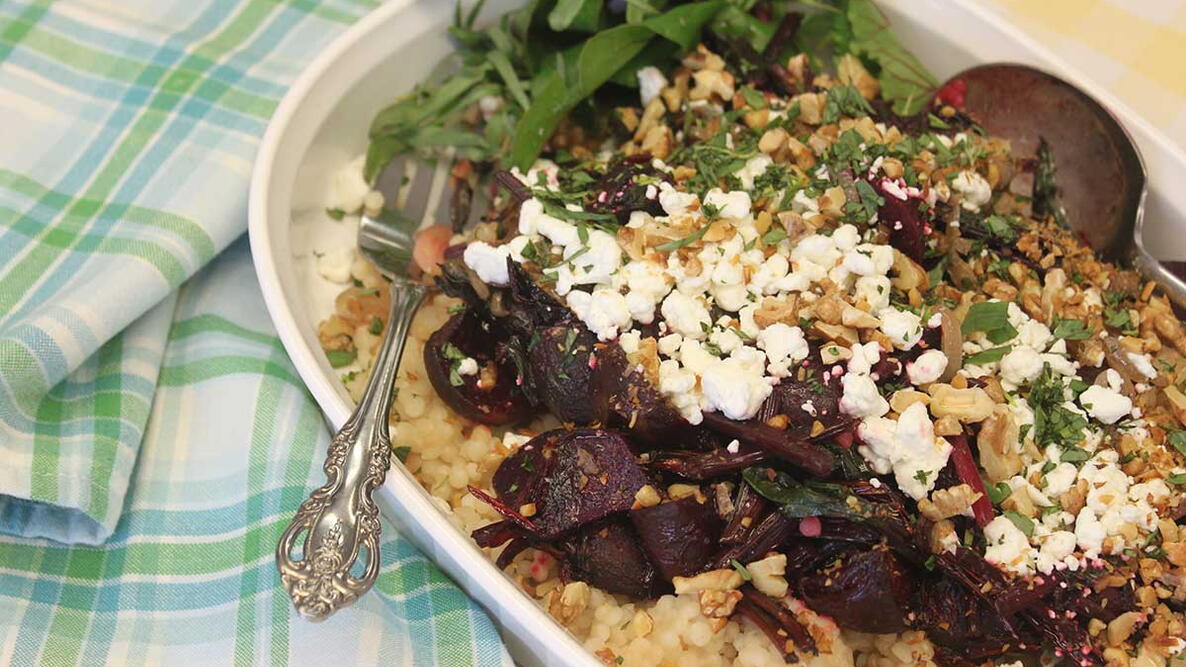 Raspberry Roasted Beets and Chèvre Over Shallot, Walnut, and Beet Greens Couscous