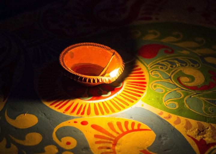 a diva lamp lit for diwali