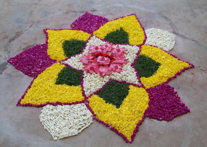 a colorful flower rangoli