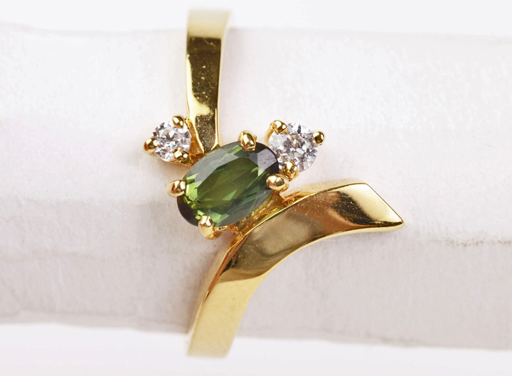 Peridot ring with diamond accents
