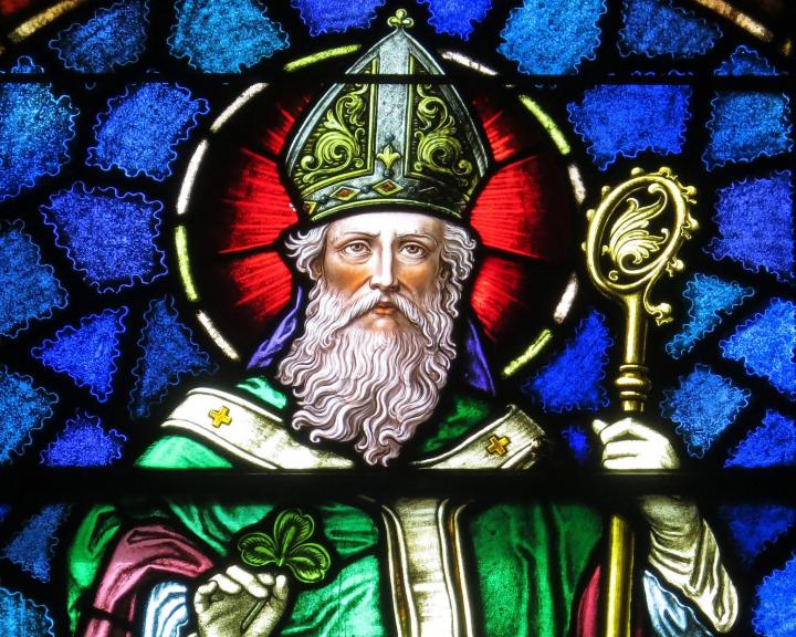 Saint Patrick stained glass, in Junction City, Ohio. Photo by Nheyob/Wikimedia Commons.