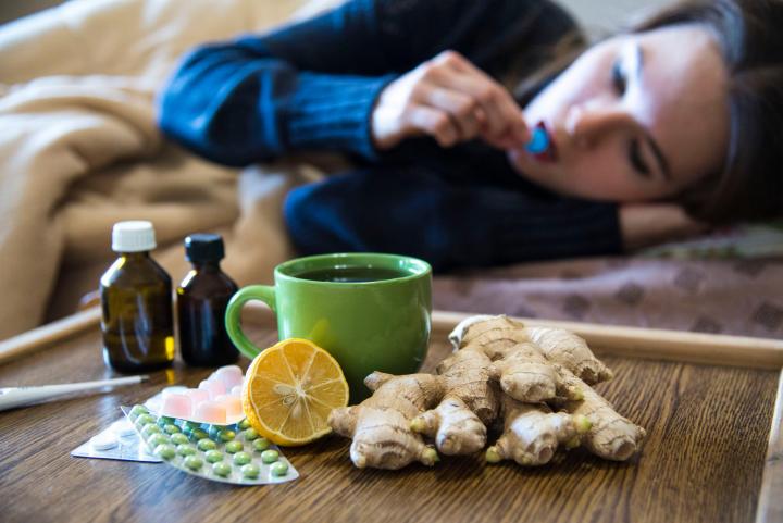 Tea with ginger, lemon, and honey. And cold medicine. Photo credit: Fogey/Shutterstock