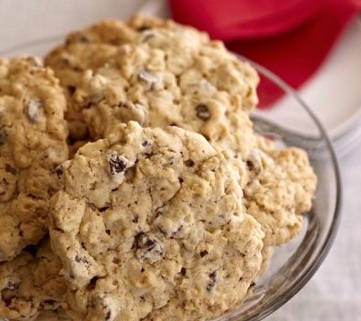 cowboy cookies, oatmeal chocolate chip cookies in a glass bowl